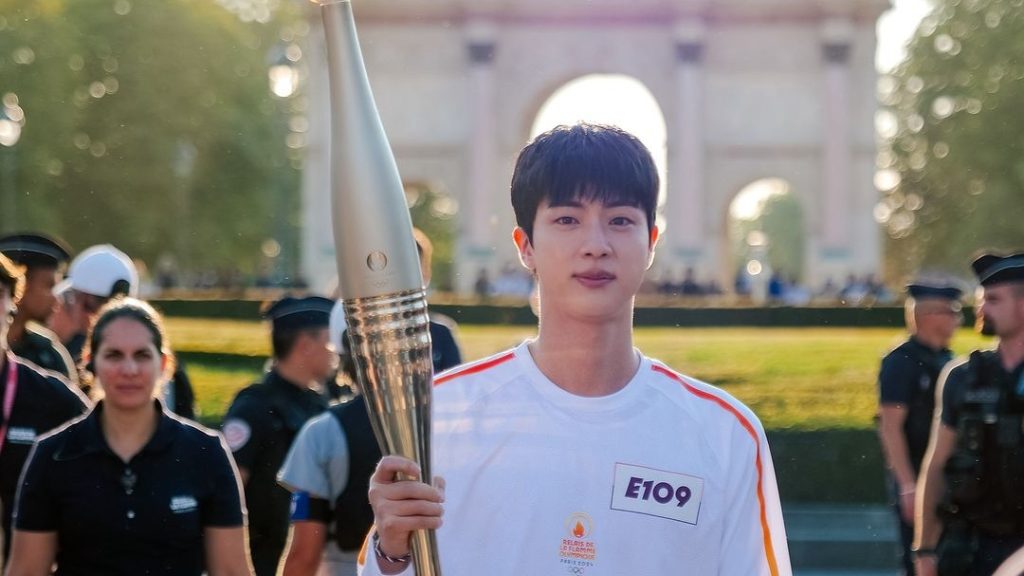 As one of approximately 10,000 torchbearers, Jin represented the Republic of Korea in the torch relay for the 2024 Paris Summer Olympics