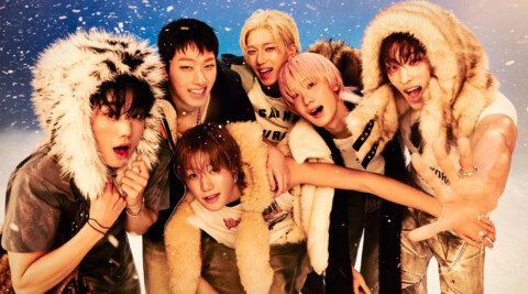 The winter theme in P1Harmony's "DUH!" concept photos, specifically the U Version, was inspired by the group's creative choice to contrast a summer comeback with a winter setting, using artificial snow to create a visually striking and refreshing atmosphere.