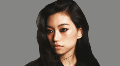Kim Doyeon, known for her striking visuals and multifaceted talent, graces the July 2025 cover of Vogue Hong Kong, marking another milestone in her career