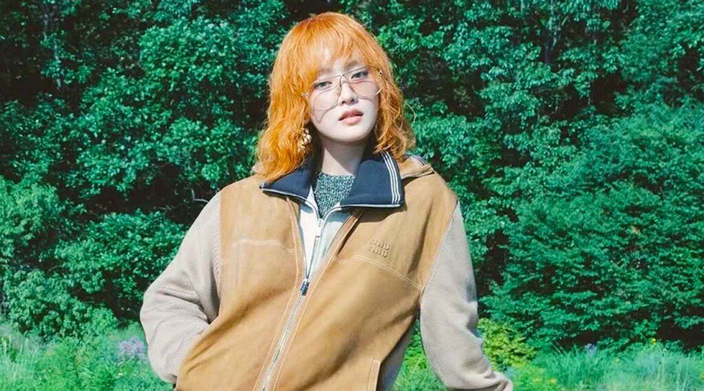 The September 2025 digital cover of W Korea unfolds with a striking collaboration between global fashion house Miu Miu and Minnie, the multifaceted member of (G)I-DLE