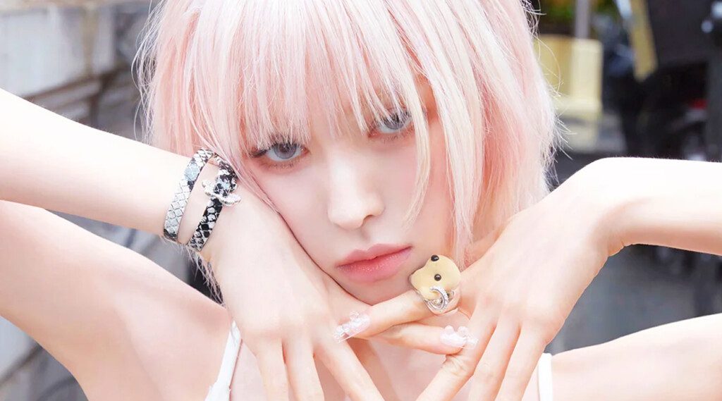 In her third solo venture, Cerulean Verge, Wendy is not merely staging a musical return—she is curating a visual manifesto. The concept photo reveals an artist enthroned at the delicate precipice of classical poise and modern rupture, where the soft hush of cerulean light does not soothe but stirs.