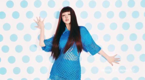 Yuqi from i-dle poses for Cosmopolitan China’s February 2026 cover in bold, high-fashion styling, showing her confidence as a Chinese K-pop star.