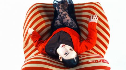 Karina of K-pop group aespa poses for Esquire Korea February 2026 issue in a futuristic fashion pictorial featuring bold styling and elegant confidence.